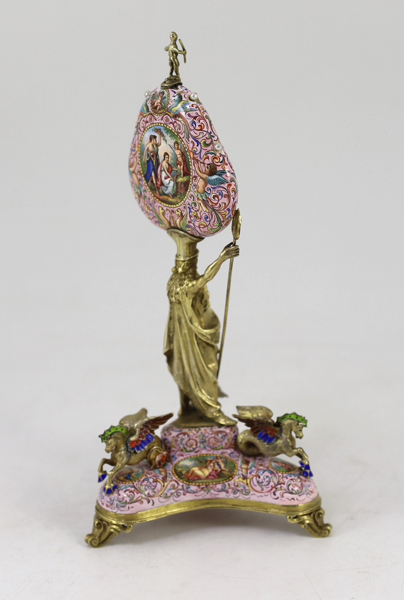 A 19th century Austrian silver-gilt and painted enamel timepiece, Karl Bender, c.1880, width 12cm, height 24cm